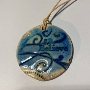 Believe Ceramic Pendant Necklace,Pendant 1 3/4 inches round, 25 inches long